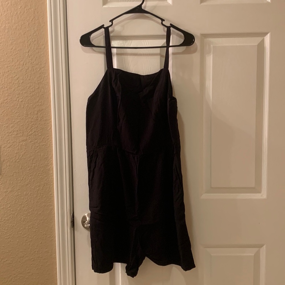 Solid black romper with pockets